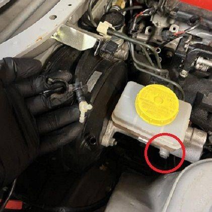 Retaining lock screw on a factory brake master cylinder